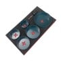 Ensemble de 5 scies-cloches bimétal de différentes tailles avec adaptateur noir sur support noir.