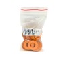 Sac plastique transparent contenant plusieurs joints d'étanchéité en cuivre de petite taille.