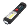 Lampe de travail compacte noire avec un bouton rouge, équipée de LED et d'un aimant.