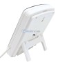 Vue arrière d'un appareil blanc avec pied support, câble et emplacement pour fixation murale.