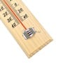 Thermomètre mural classique avec échelle de température en degrés Celsius et Fahrenheit sur support en bois clair.