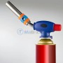 Pistolet à flamme bleu et rouge fixé sur une cartouche d'un brûleur à gaz butane.